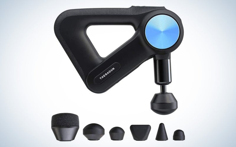 TheraGun pro percussion massager with its attachments